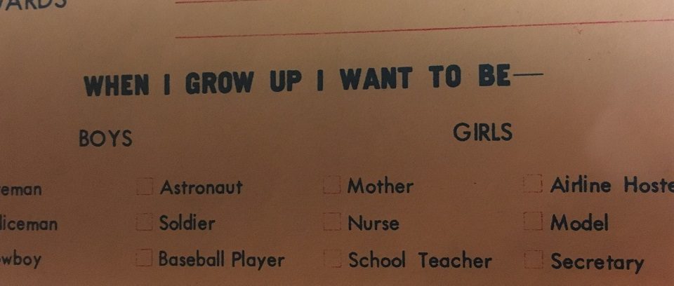 Photo of text from 1970s elementary school memory book limiting girls to roles such as mother, nurse, and school teacher.