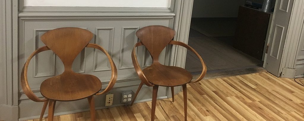 Photo of empty chairs in mediation waiting area