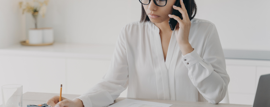 Photo of employee taking a sexual harassment complaint by telephone