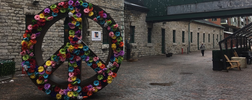 Photo of Peace Symbol Art in Toronto Distillery District.