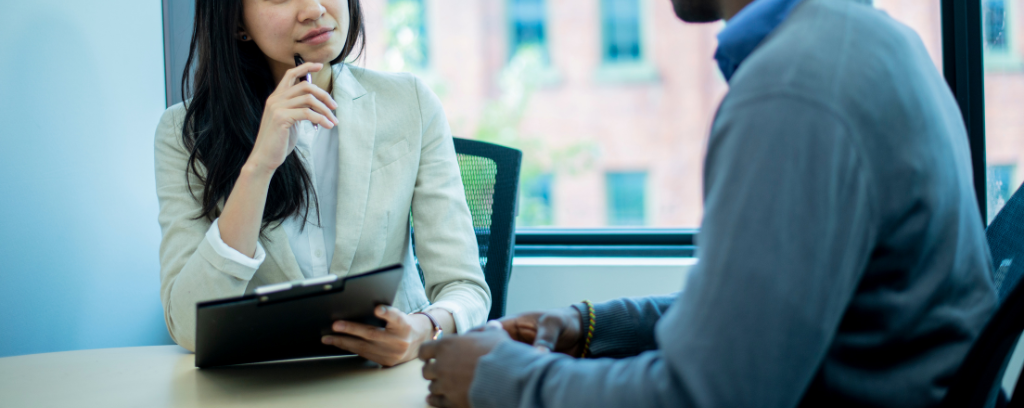 Photo of mediator actively listening to a party