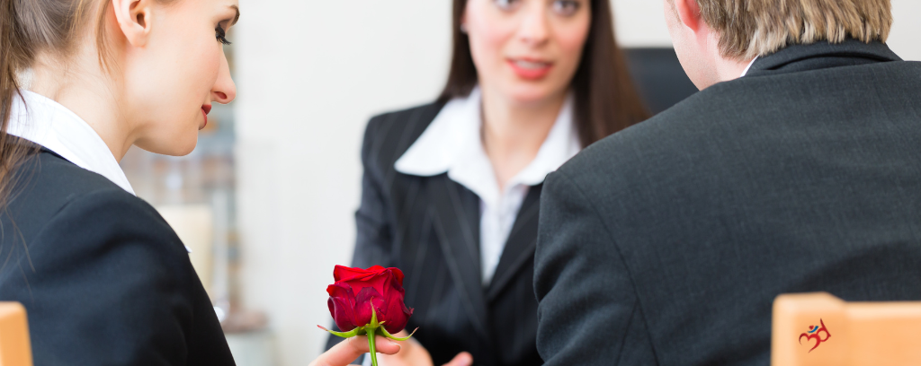 Photo of funeral director speaking to employees