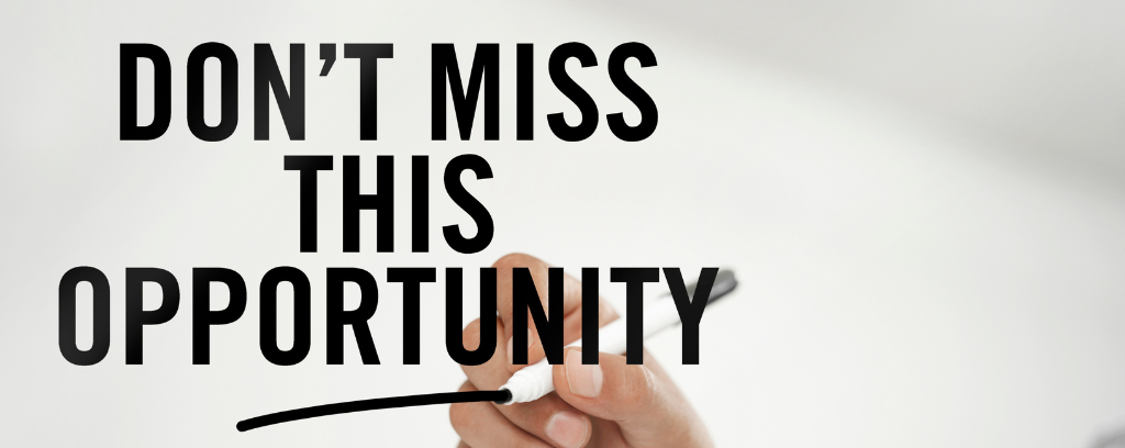 Photo of hand writing "Don't miss this opportunity" with black marker